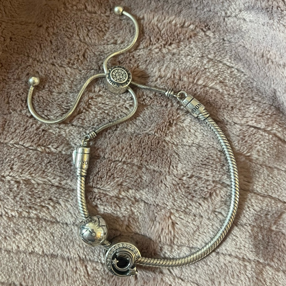 Genuine Pandora bracelet with charms. NWOT